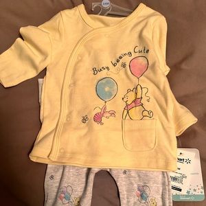Brand new Winnie the Pooh outfit.